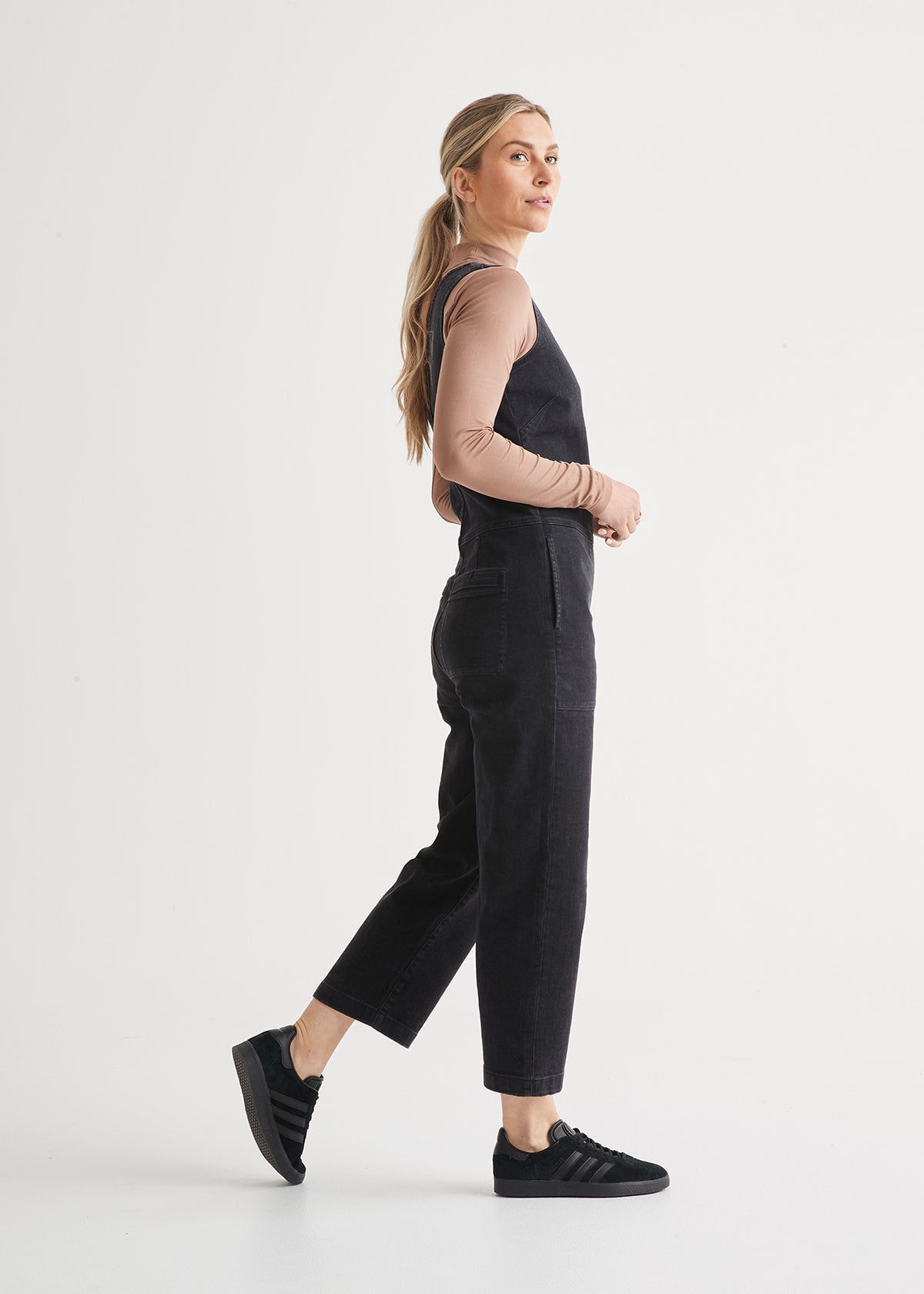 womens aged black stretch denim jumpsuit frontwomens aged black stretch denim jumpsuit side