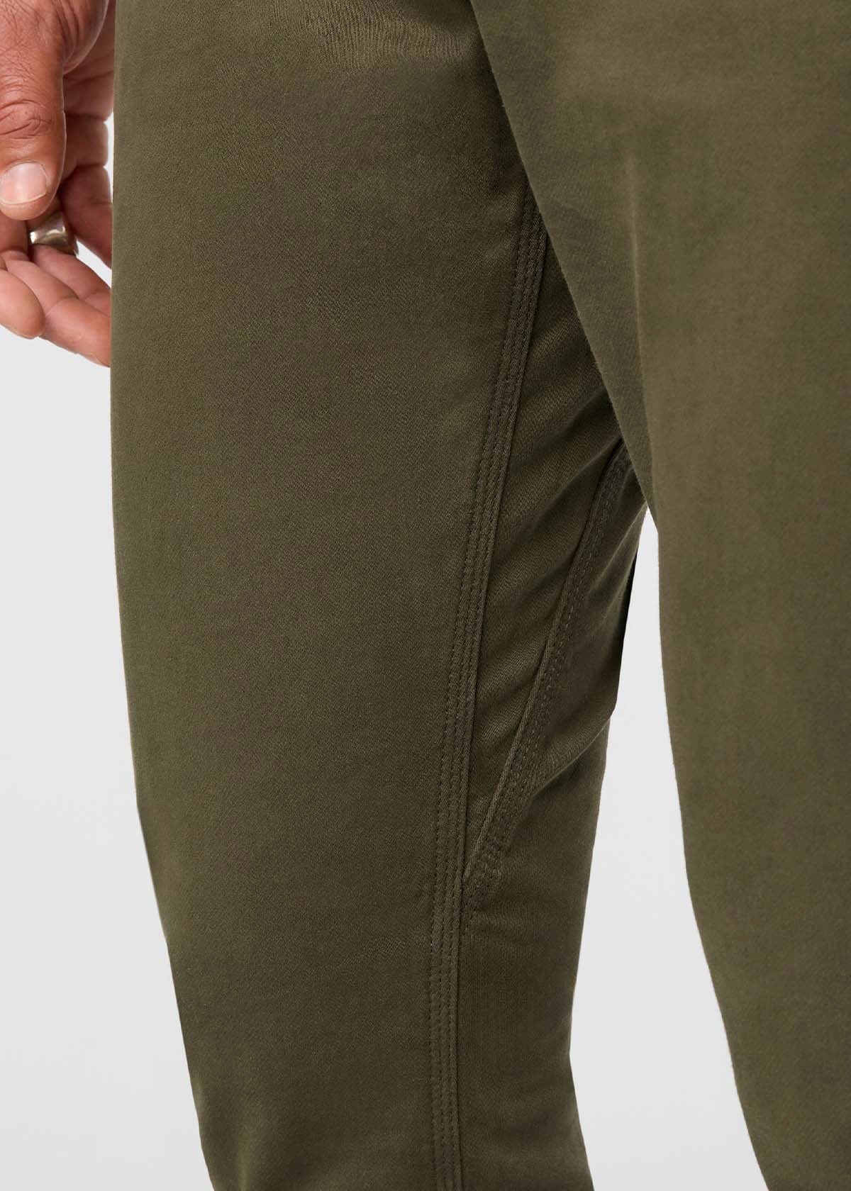 man wearing a army green Relaxed Fit Sweatpant gusset detail