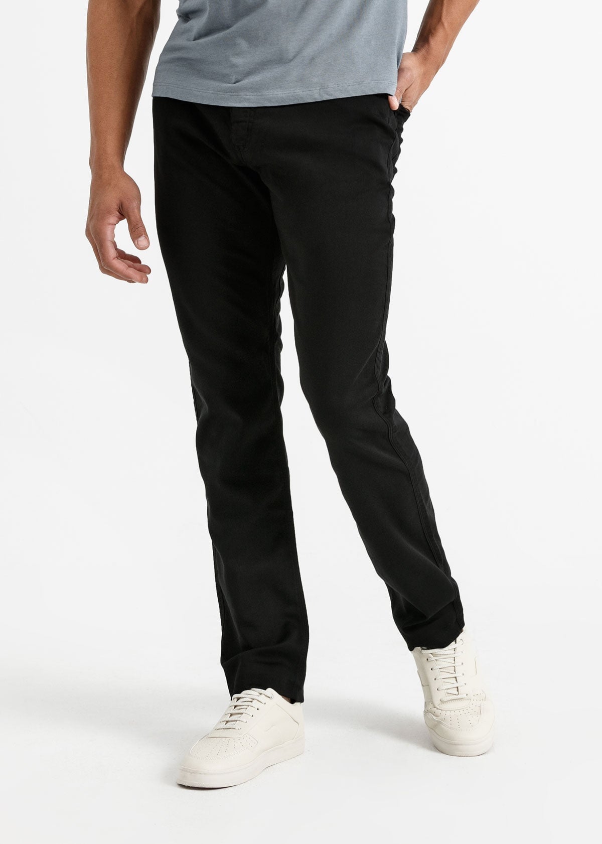 man wearing a black Relaxed Fit Sweatpant front