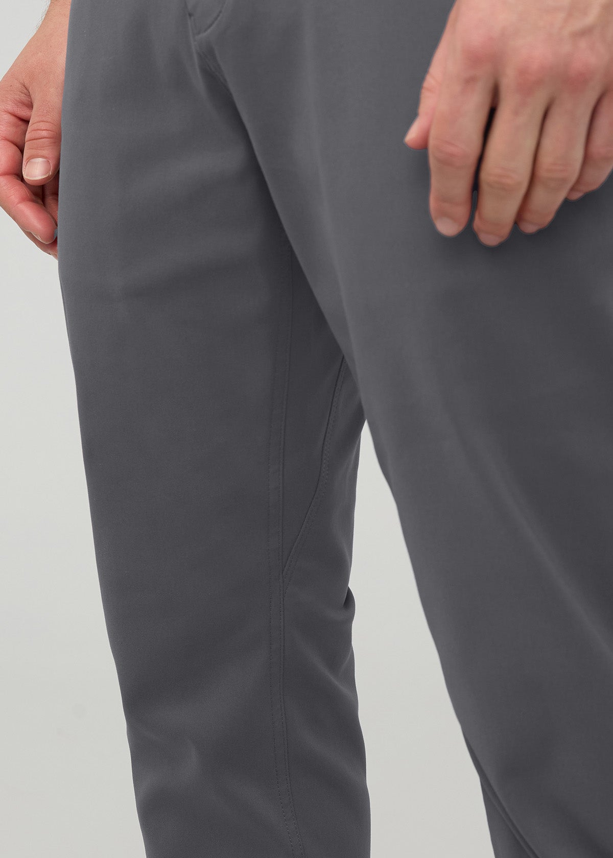 Gray tapered trouser with relaxed fit shown on model from waist to ankle.
