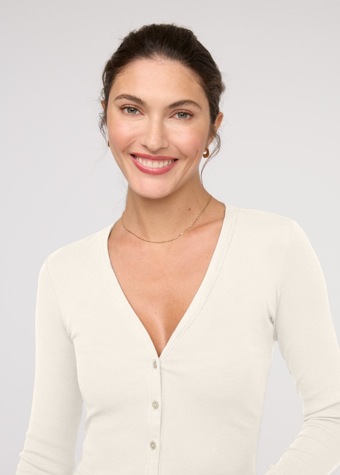 womens ecru fitted pima cotton long sleeve button down front neckline detail