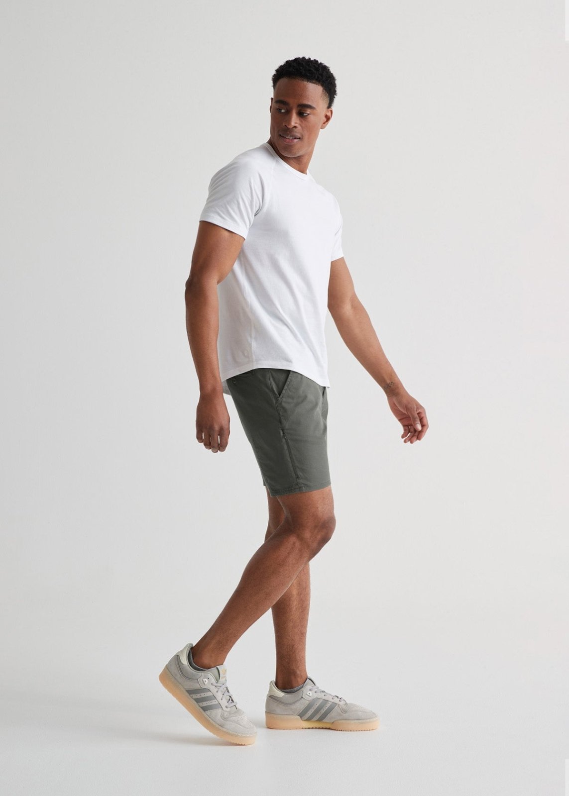 mens lightweight light green-grey shorts full body