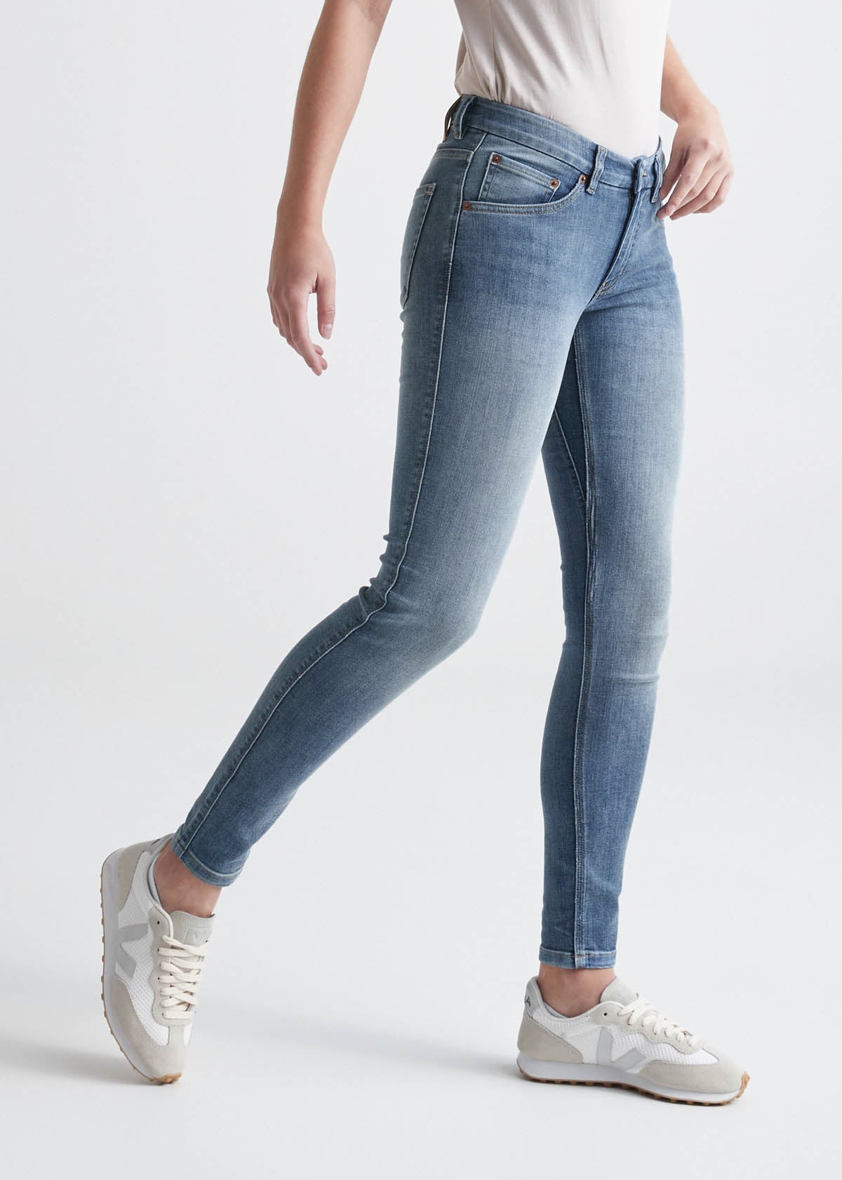 womens light blue mid rise skinny stretch jeans side