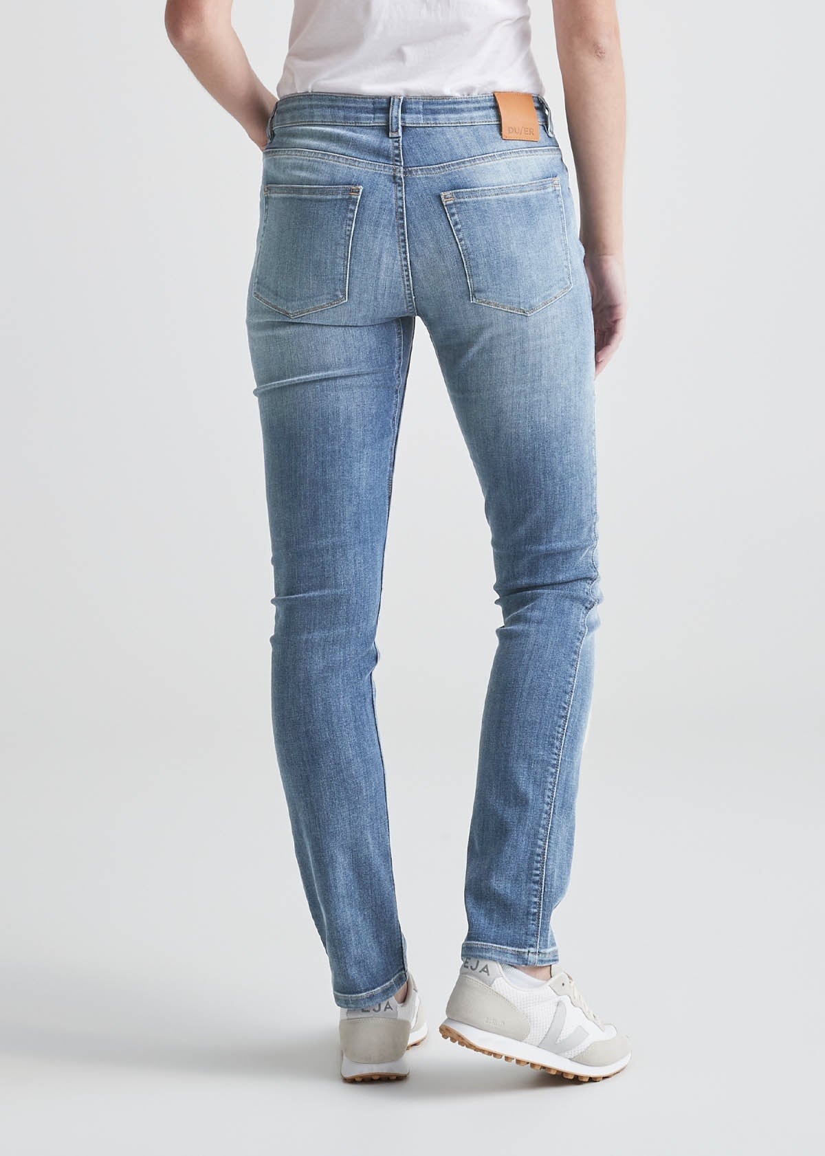 womens light blue slim straight stretch jeans back