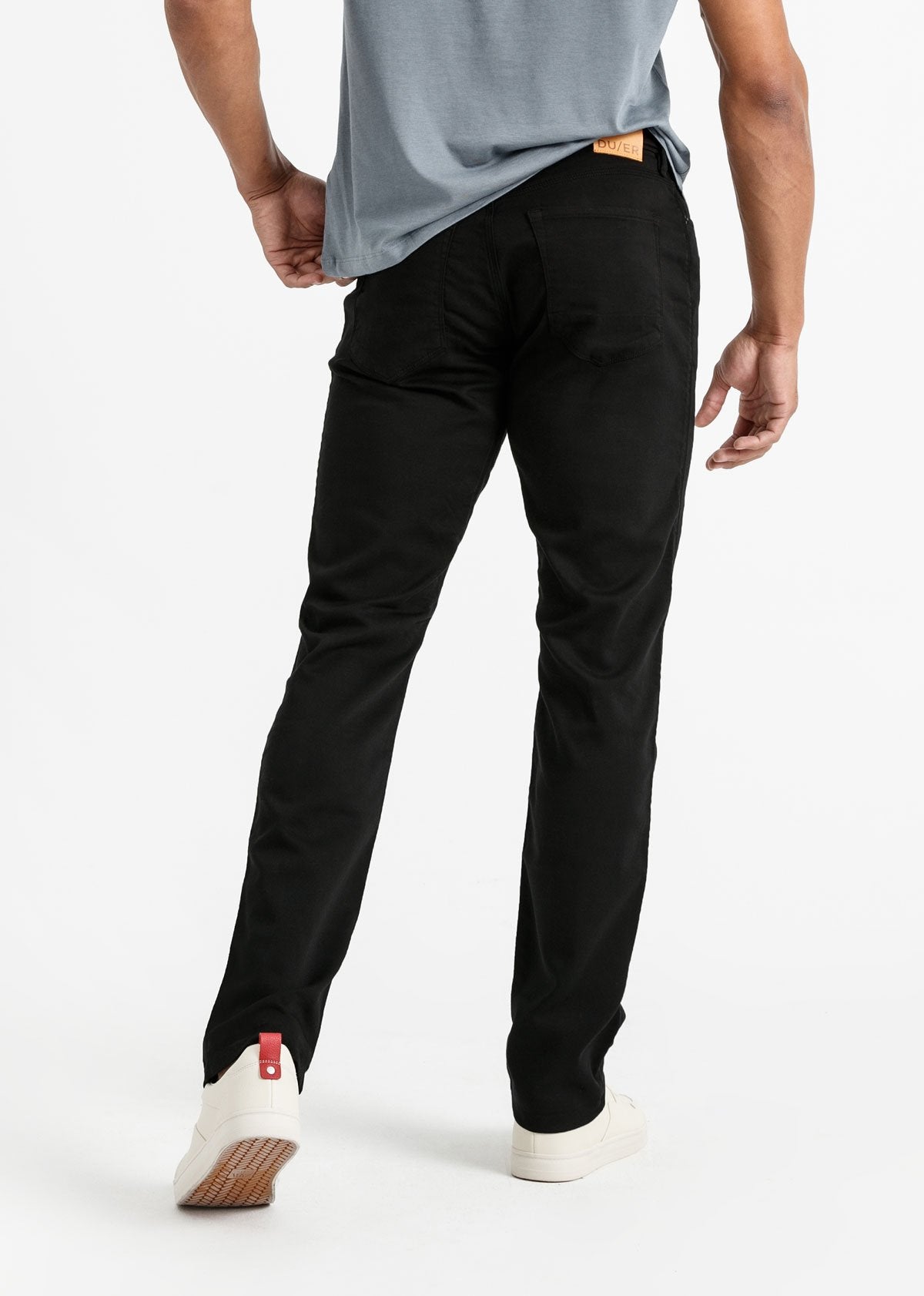 man wearing a black Relaxed Fit Sweatpant back